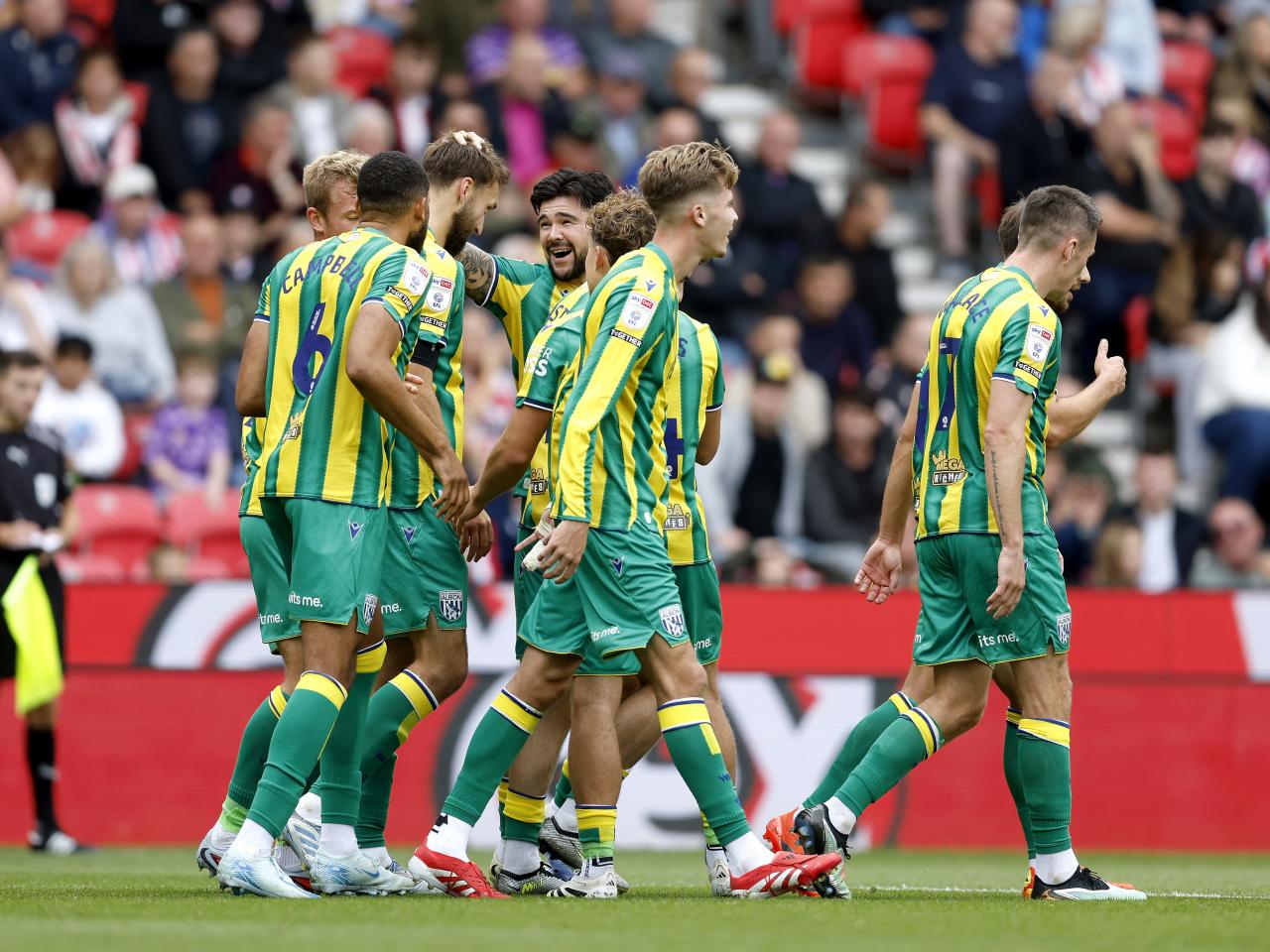 Nat Phillips celebrates scoring v Stoke with team-mates