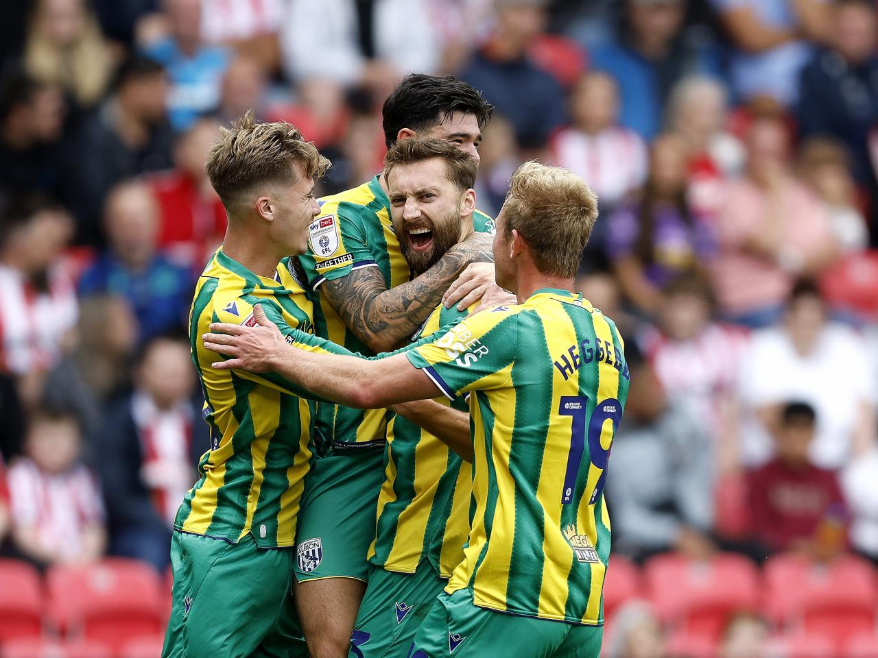 Nat Phillips celebrates scoring v Stoke with team-mates