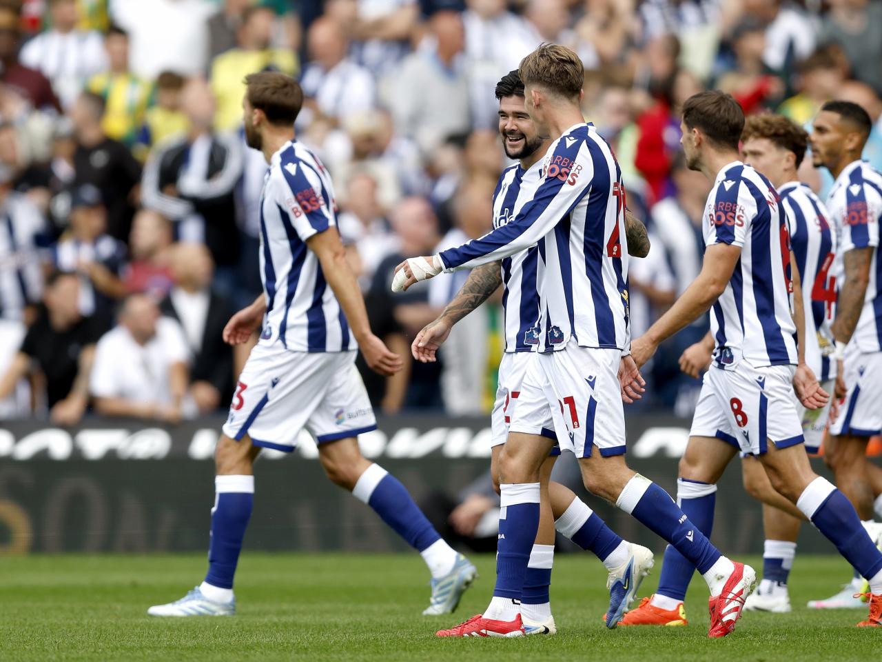 Isaac Price celebrates with team-mates after scoring against Blackburn 