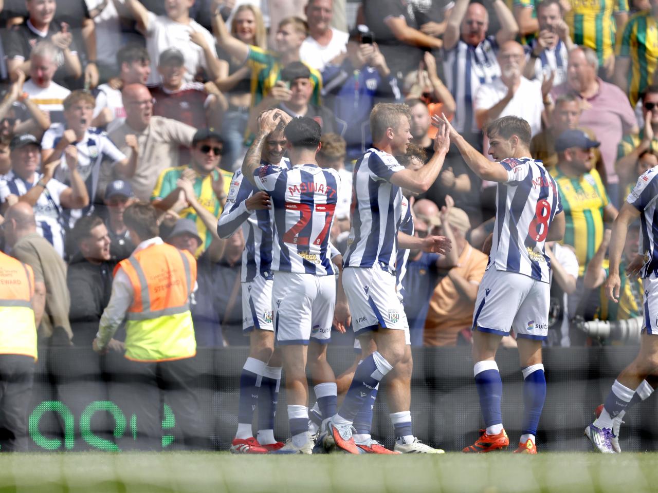 Isaac Price celebrates scoring his first goal at Wrexham with team-mates