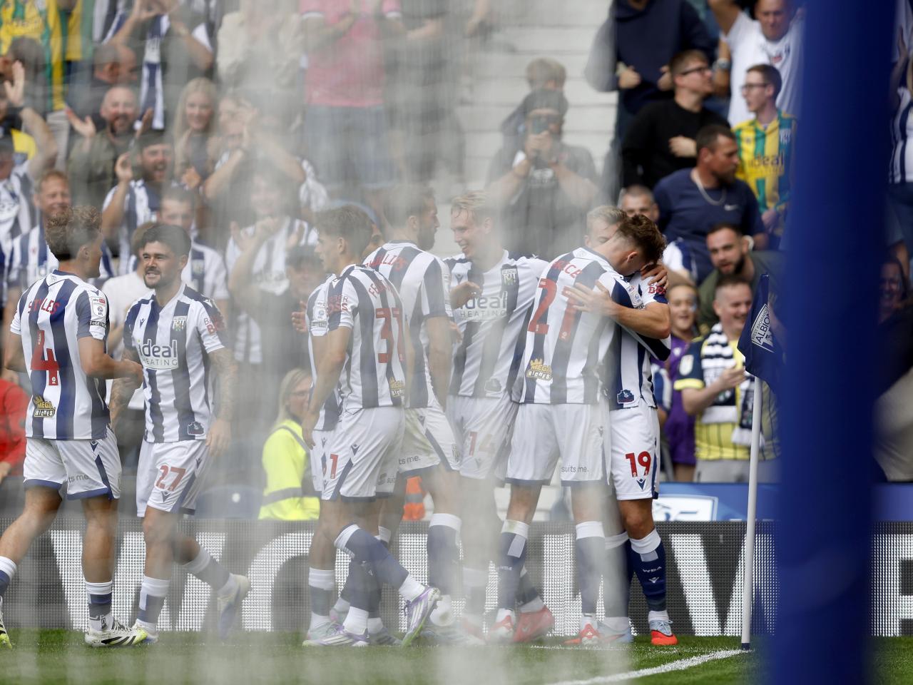 Isaac Price celebrates with team-mates after scoring against Blackburn 
