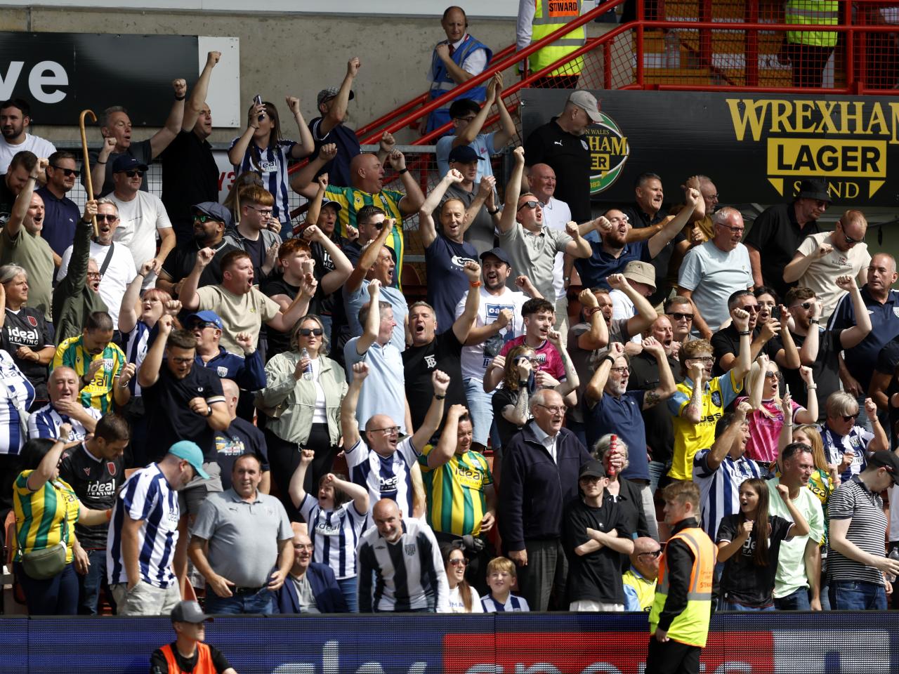 Albion fans celebrating a goal at Wrexham 