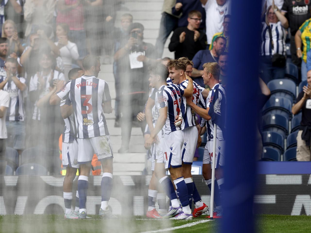 Isaac Price celebrates with team-mates after scoring against Blackburn 