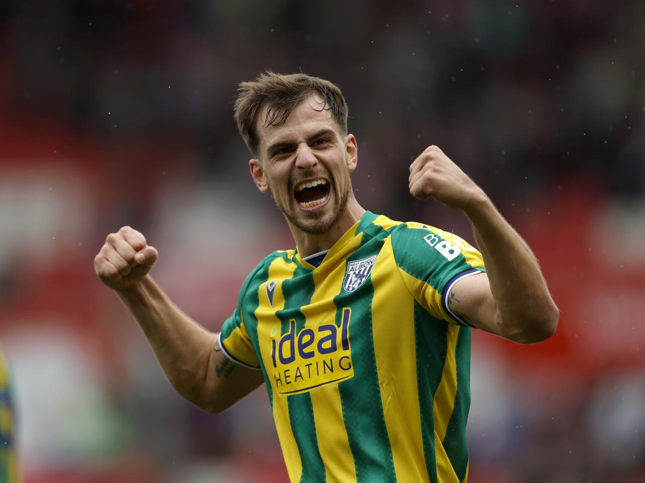 Jayson Molumby applauding WBA fans at Stoke