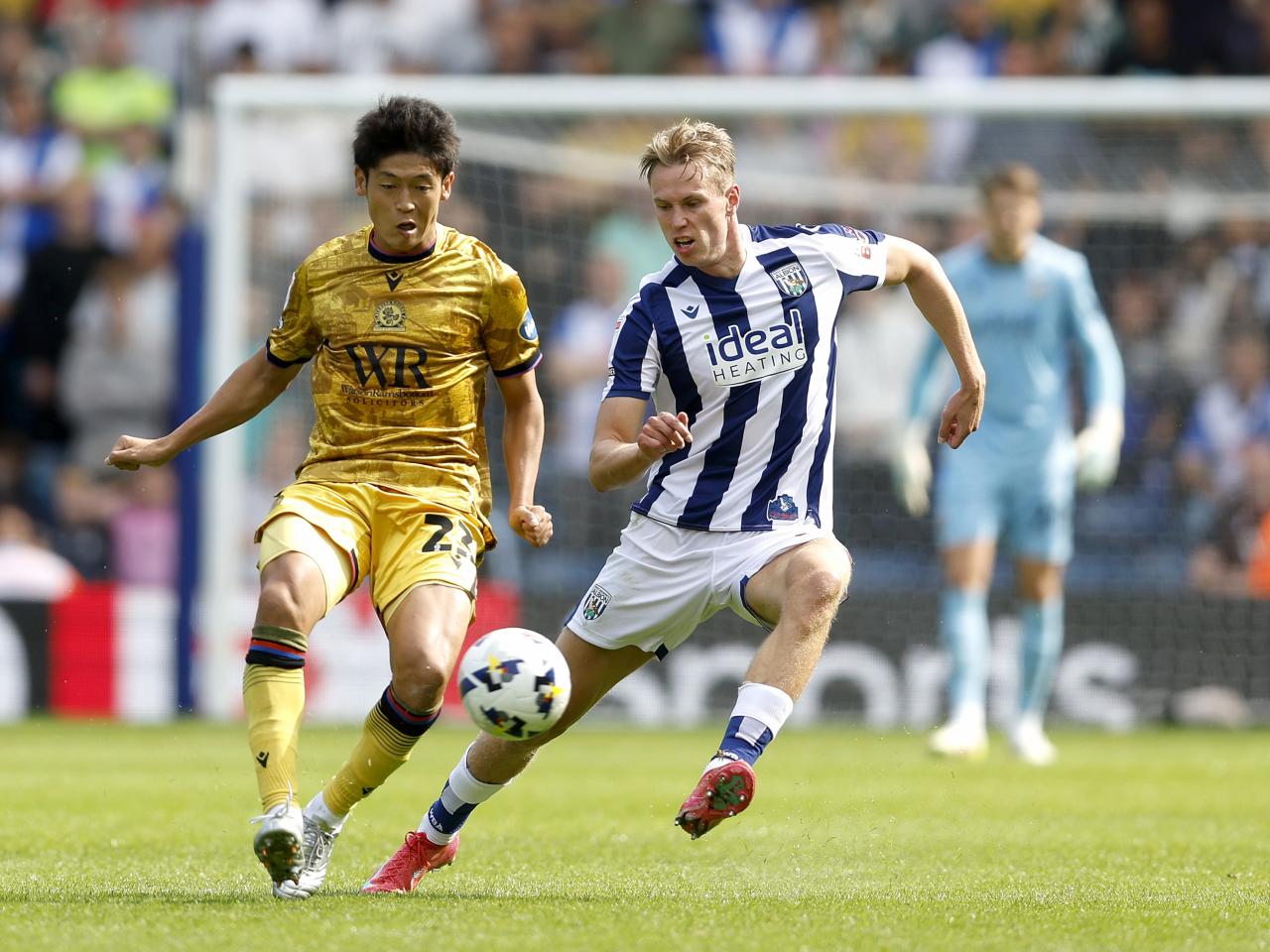Torbjørn Heggem fighting for the ball against a Blackburn player