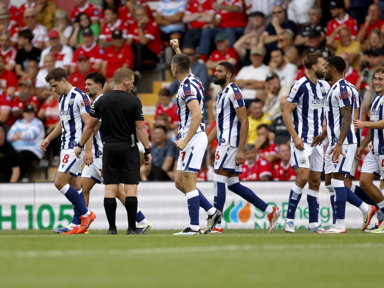 Jed Wallace celebrates with team-mates after scoring against Wrexham