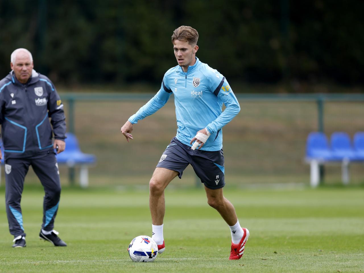 Isaac Price on the ball during training 