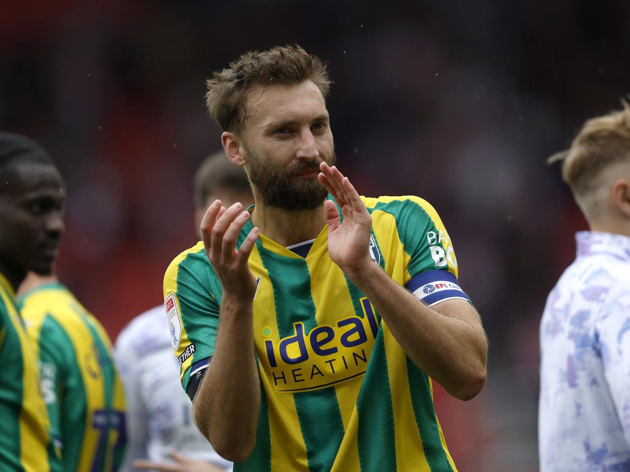 Nat Phillips applauding WBA fans at Stoke