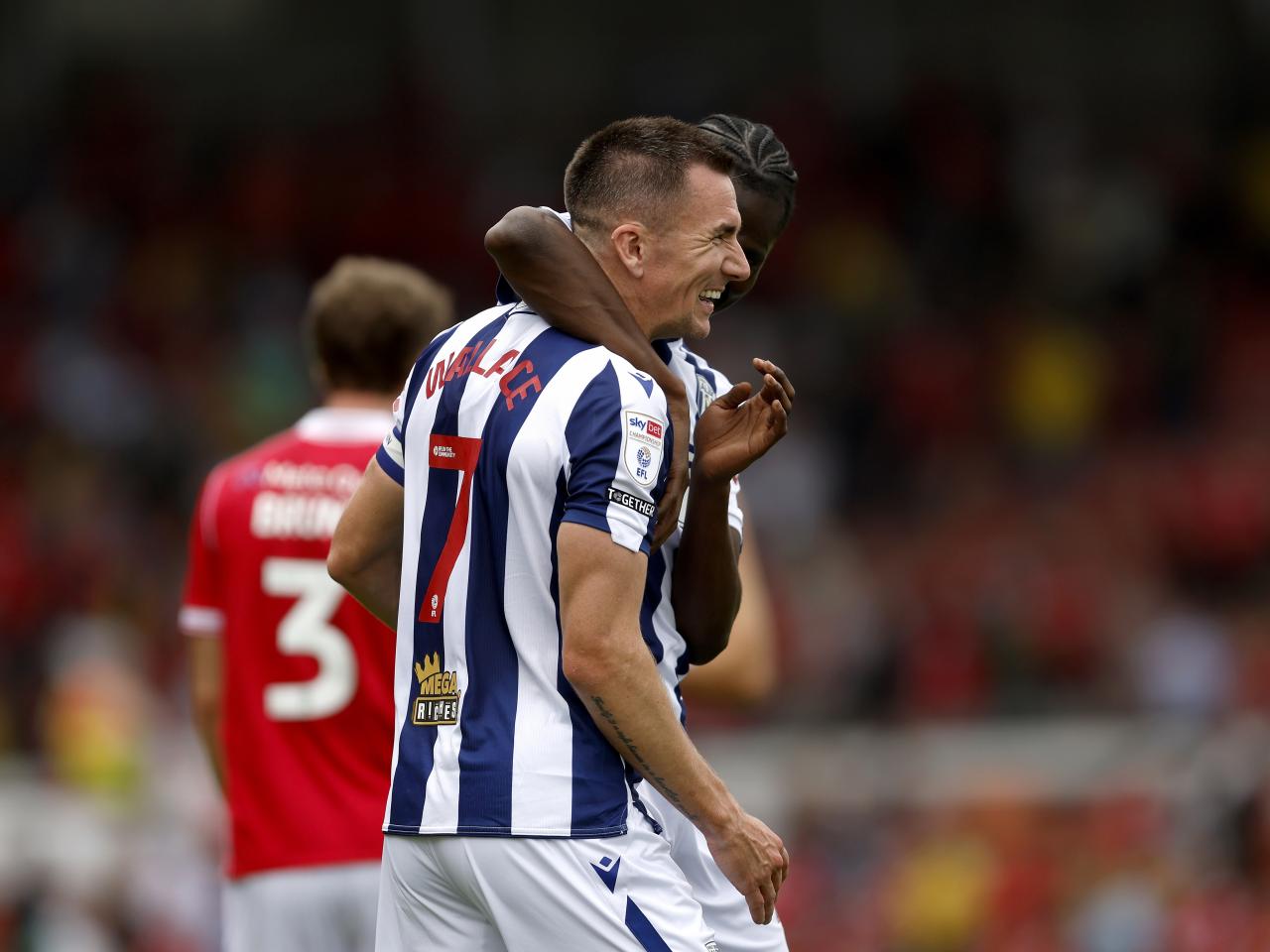 Jed Wallace laughing after beating Wrexham