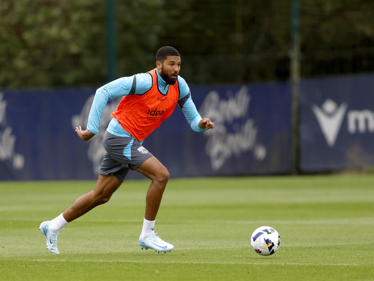 George Campbell on the ball during training 