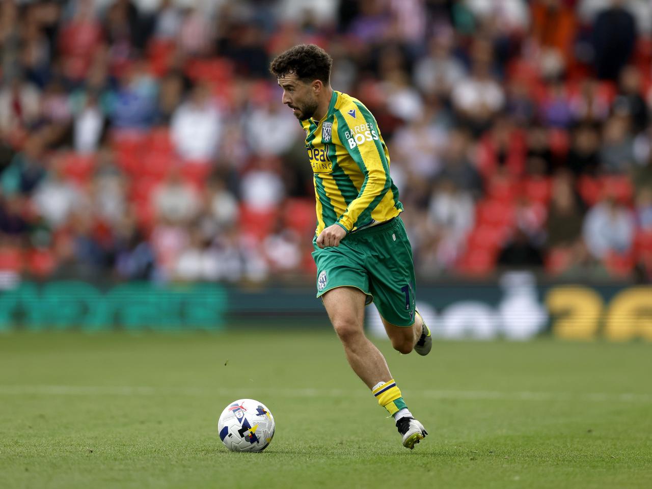 Mikey Johnston in action against Stoke 