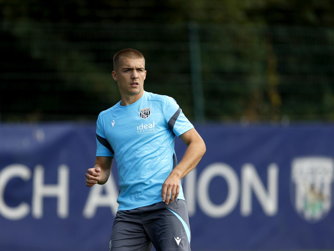 Alfie Gilchrist running in training 