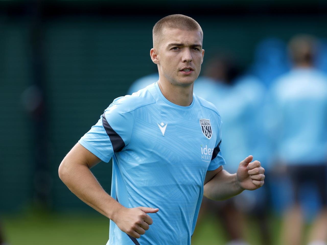 Alfie Gilchrist running in training 