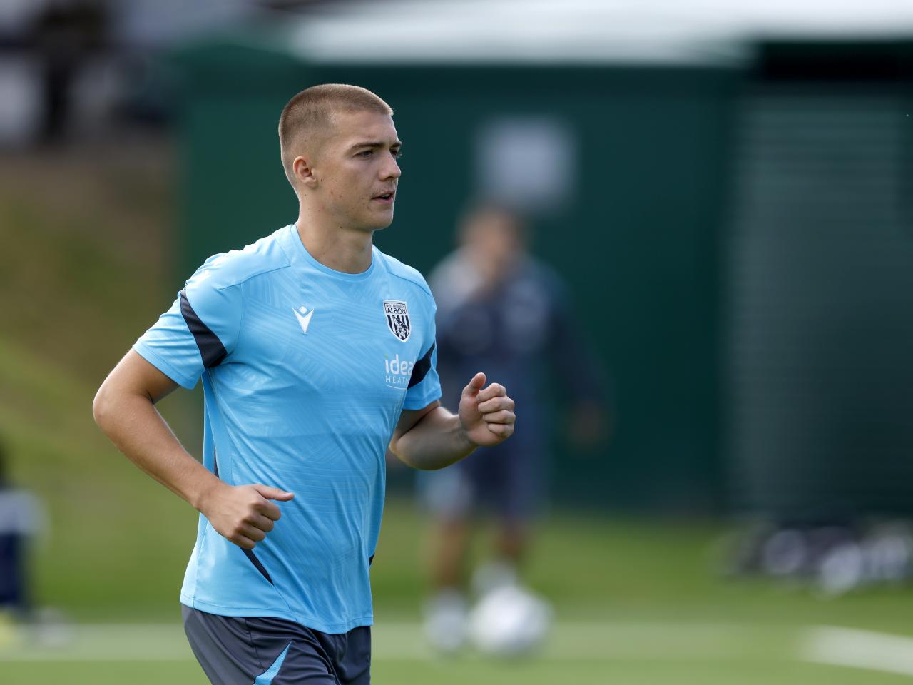 Alfie Gilchrist running in training 