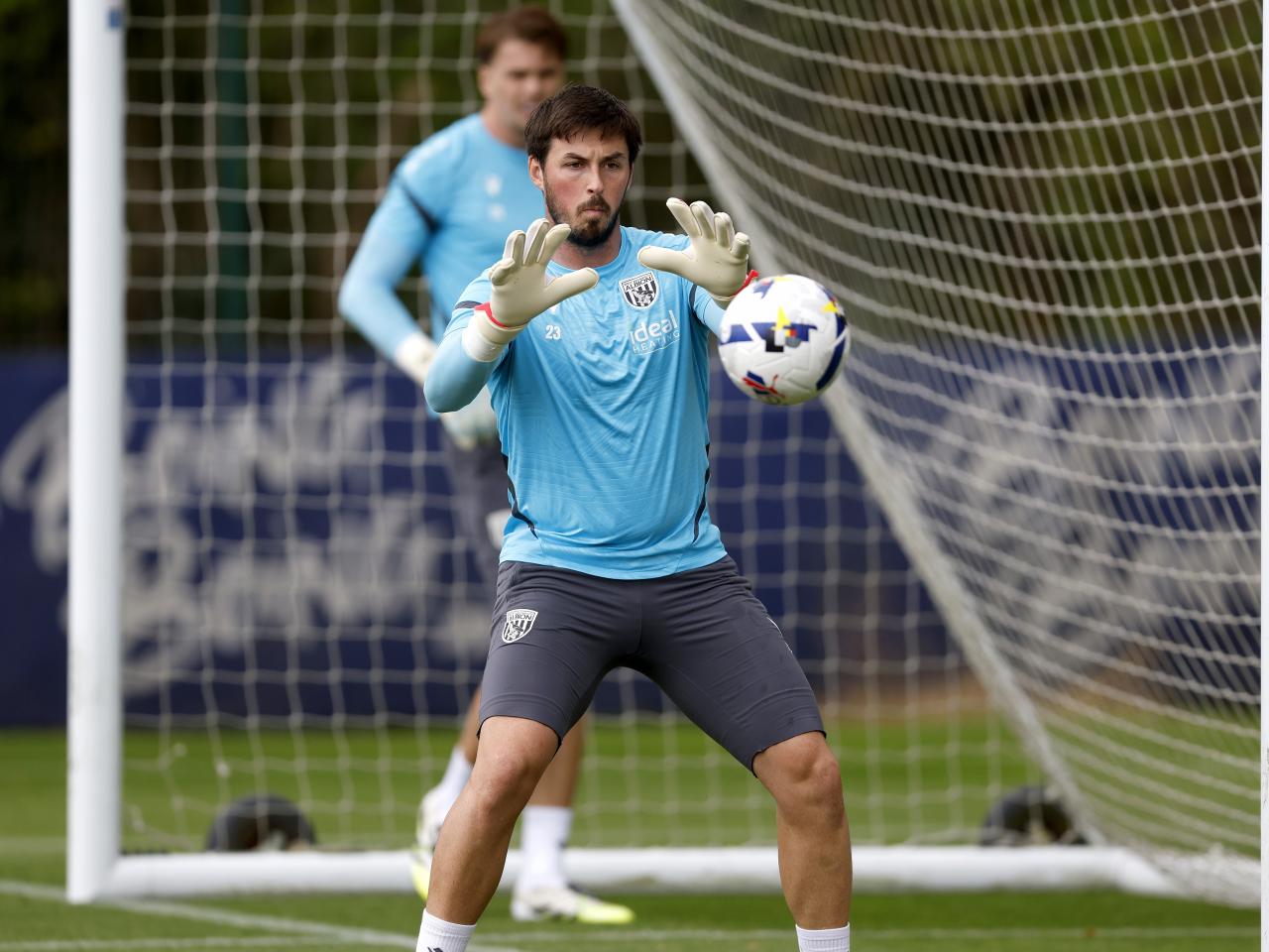 Joe Wildsmith catching the ball in training 