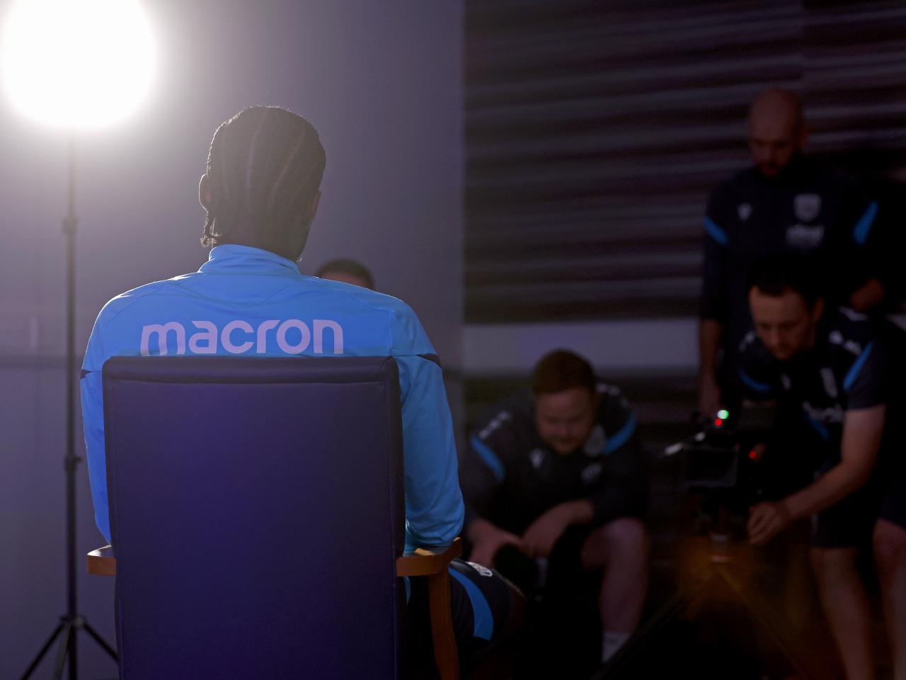 Samuel Iling-Junior being interviewed by WBA TV with camera crew behind him