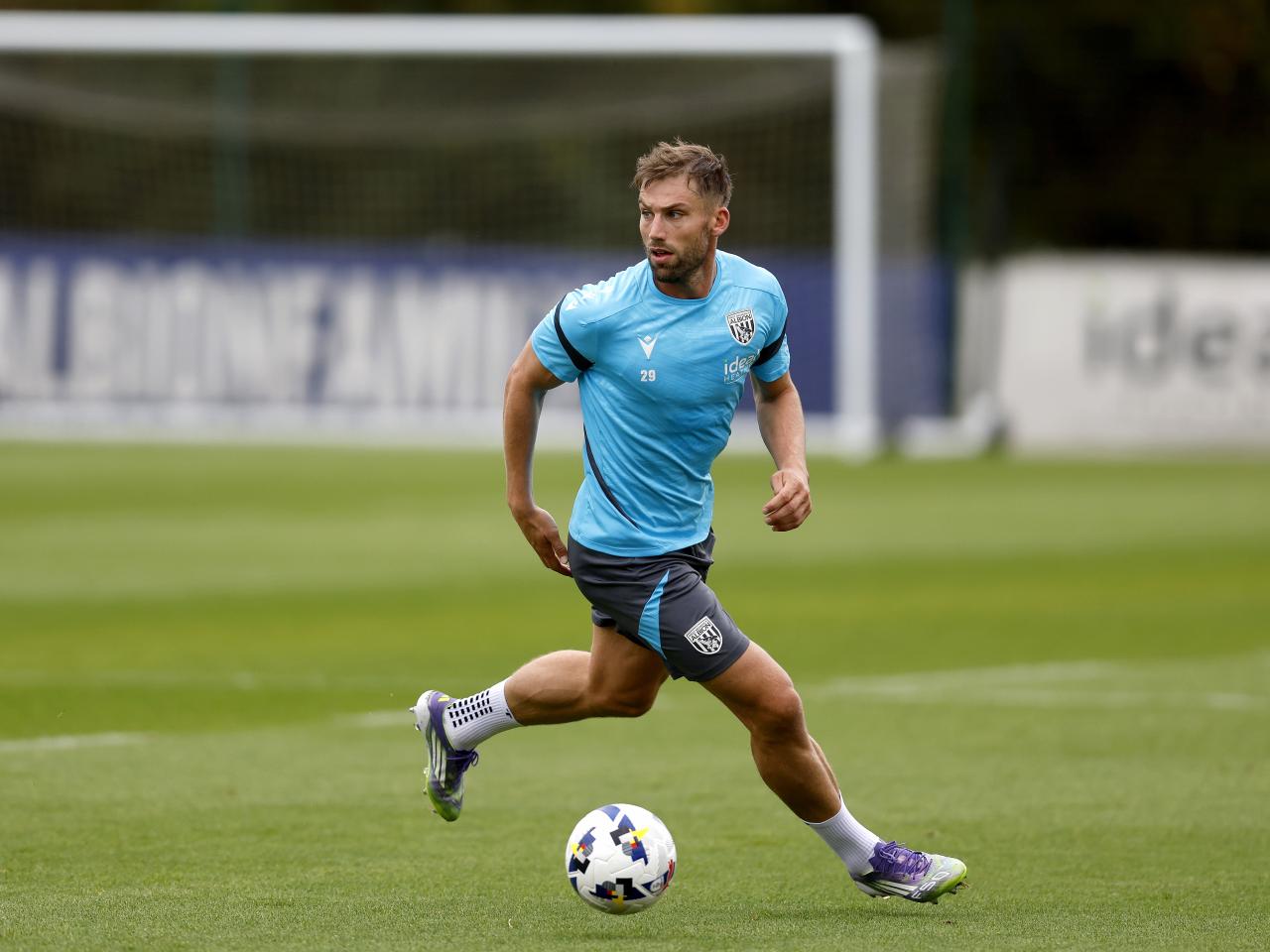 Charlie Taylor on the ball during training 