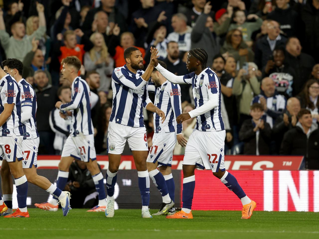 Samuel Iling-Junior celebrates scoring against Leicester with team-mates