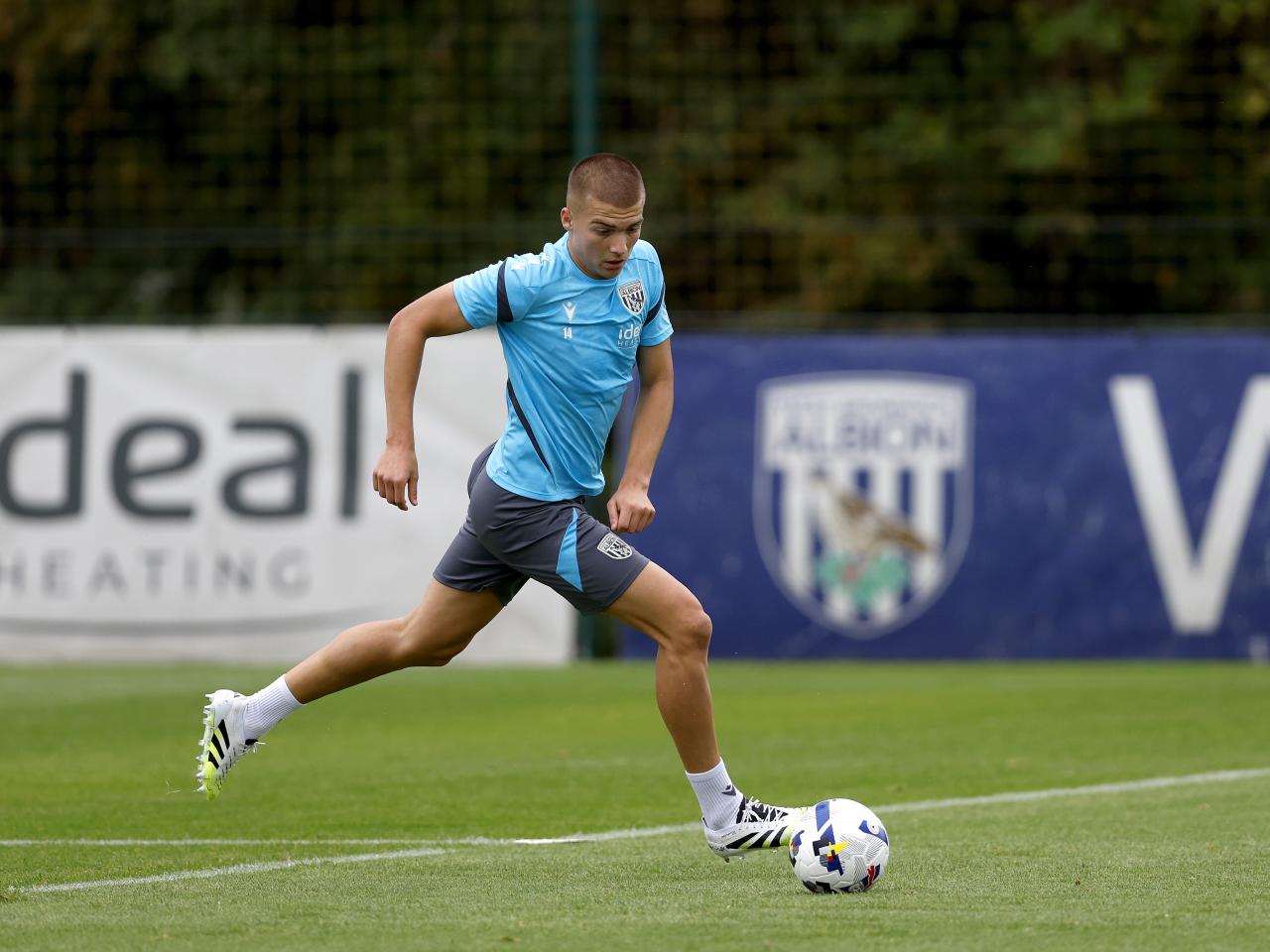 Alfie Gilchrist on the ball during training