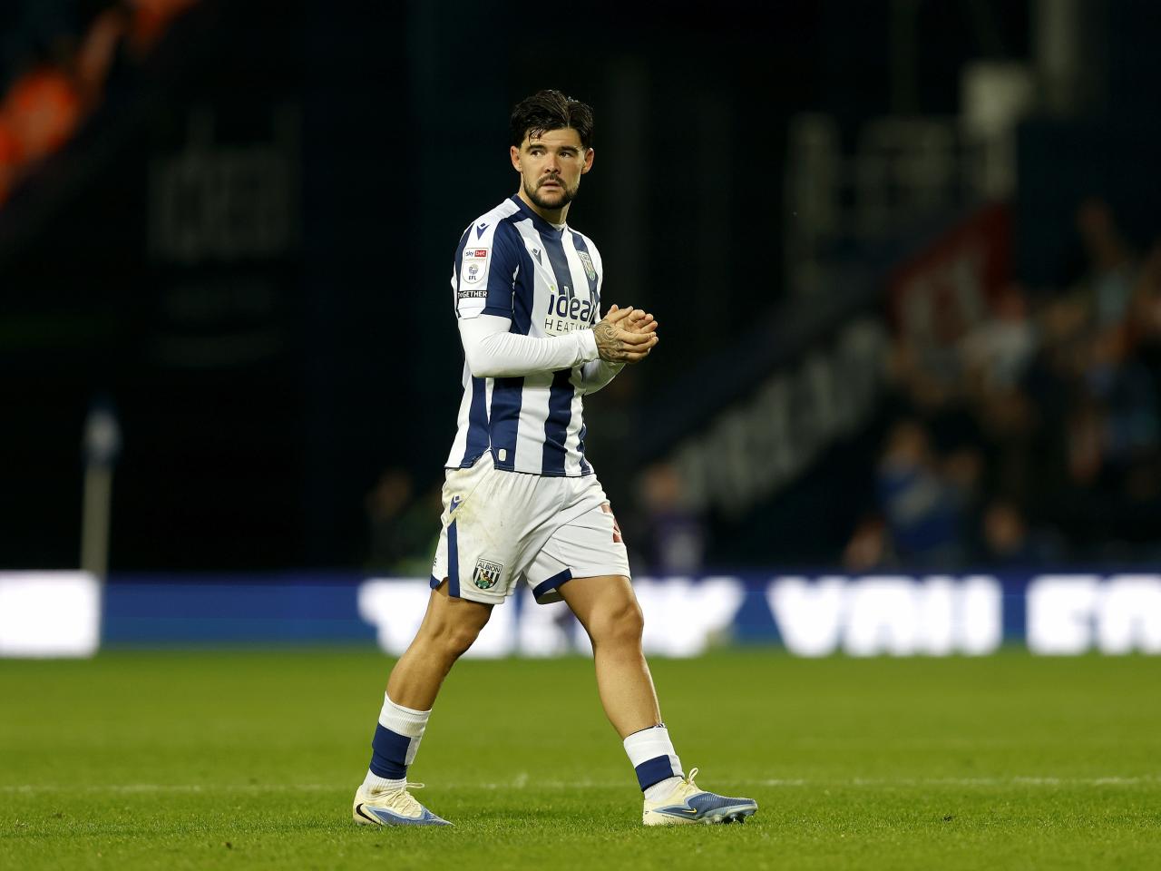 Alex Mowatt applauding WBA fans after the game with Leicester 