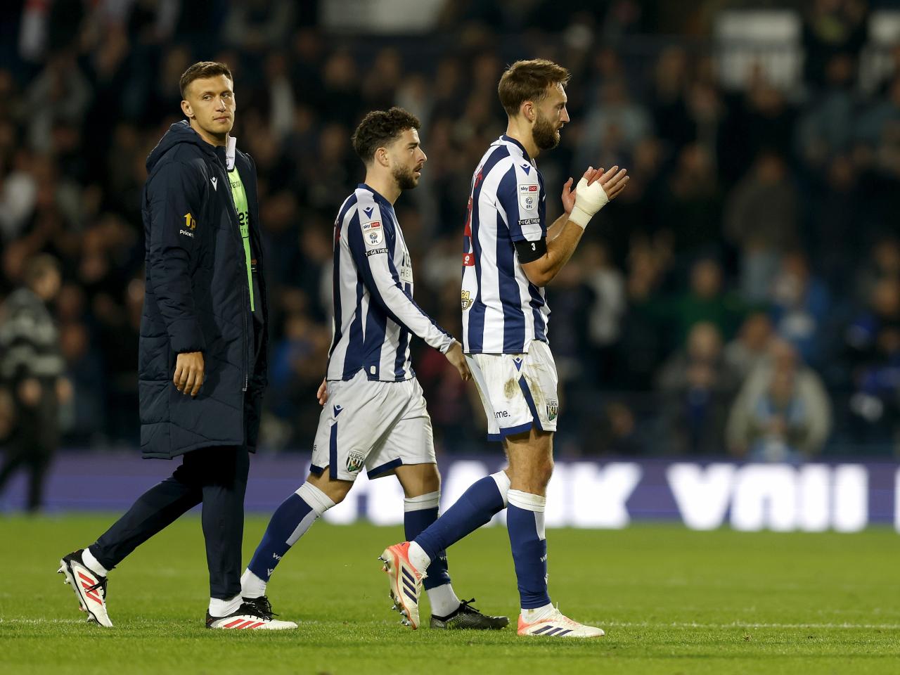 Nat Phillips applauding WBA fans after the game with Leicester 