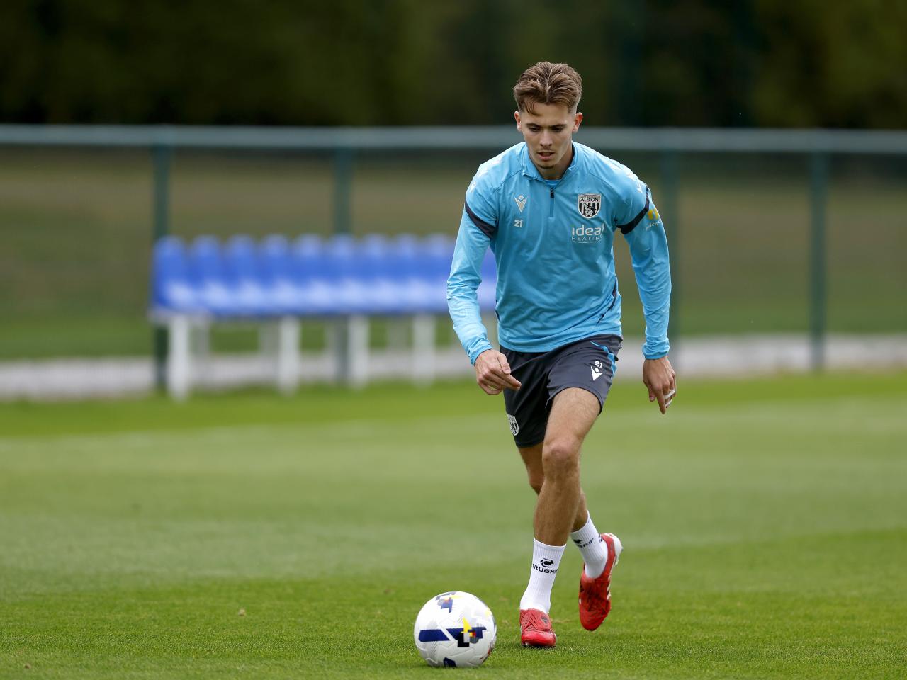 Isaac Price on the ball during training