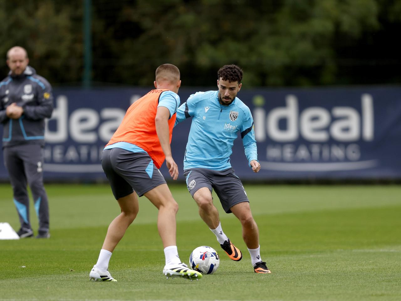 Mikey Johnston on the ball during training