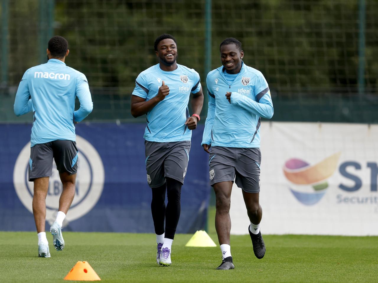 Josh Maja and Ousmane Diakité smiling during training 
