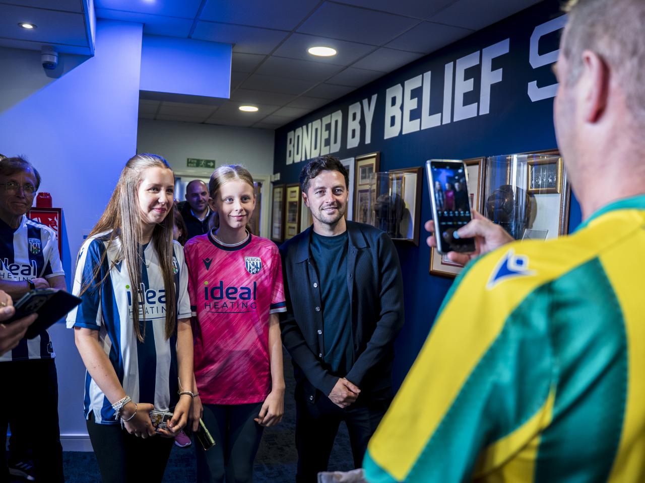 Ryan Mason posing for WBA fans in the East Stand