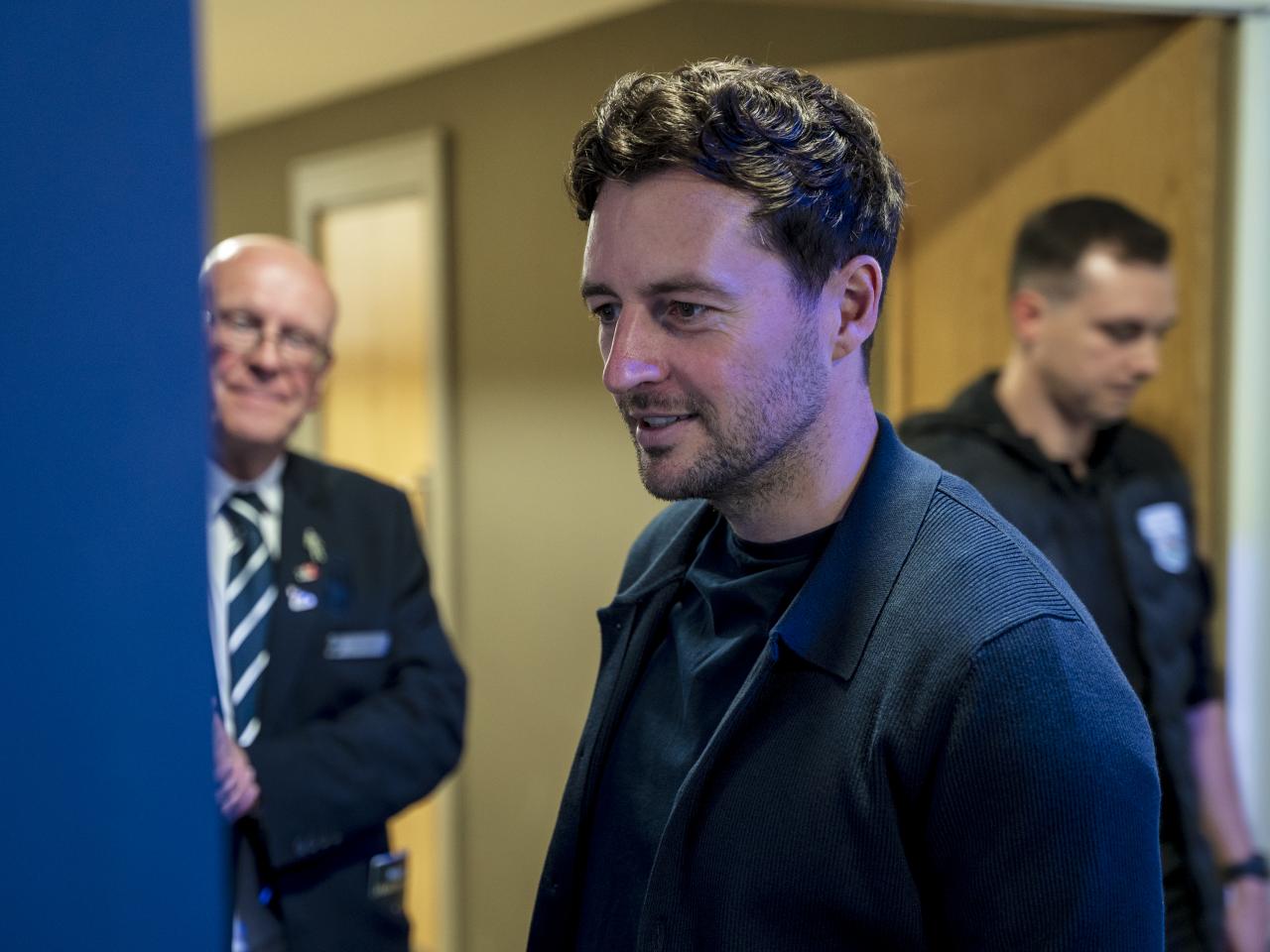 Ryan Mason walking through the East Stand looking at all the memorabilia and a specially curated gallery of 125 iconic Hawthorns images