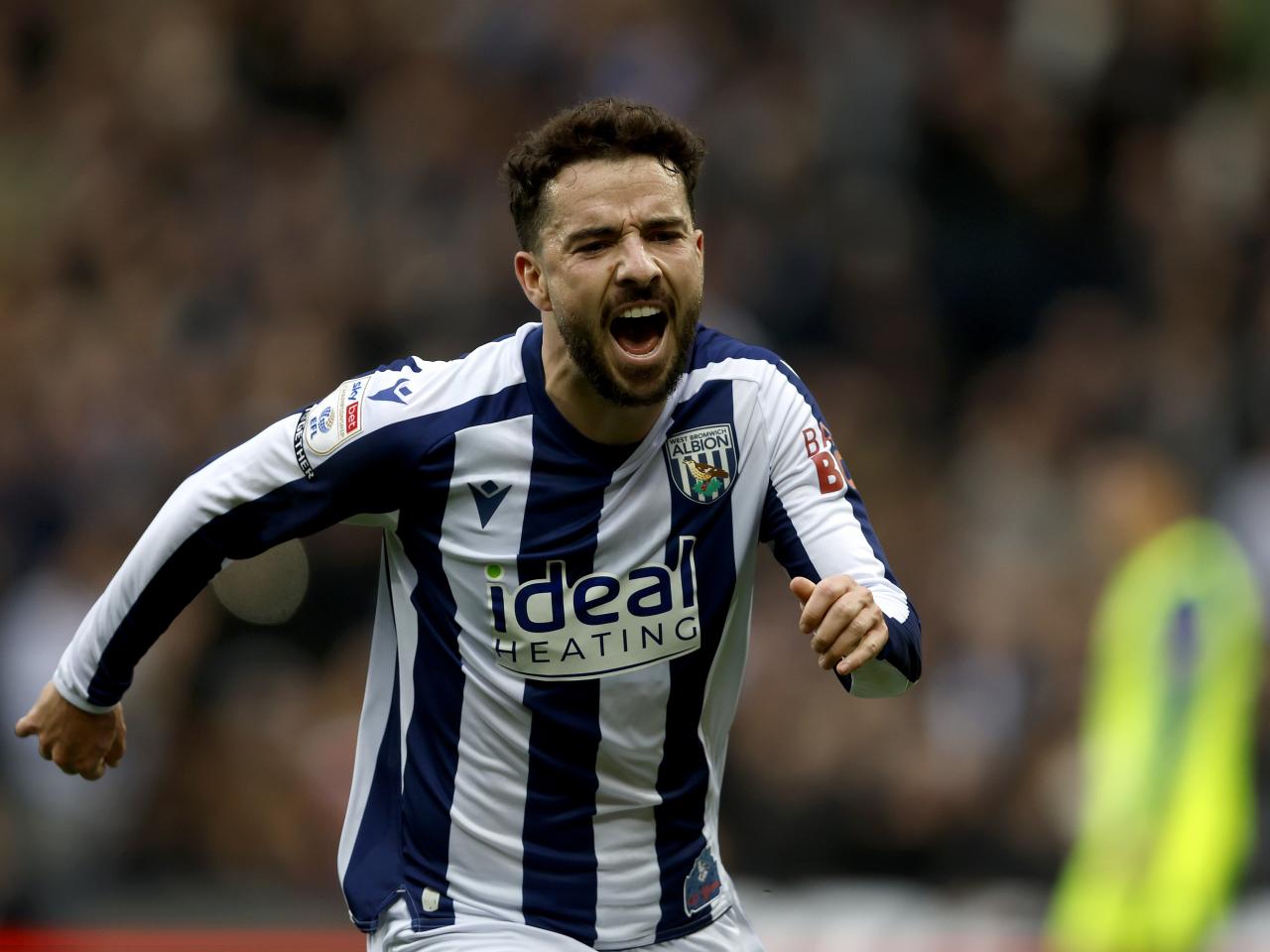 Mikey Johnston celebrates scoring against PNE
