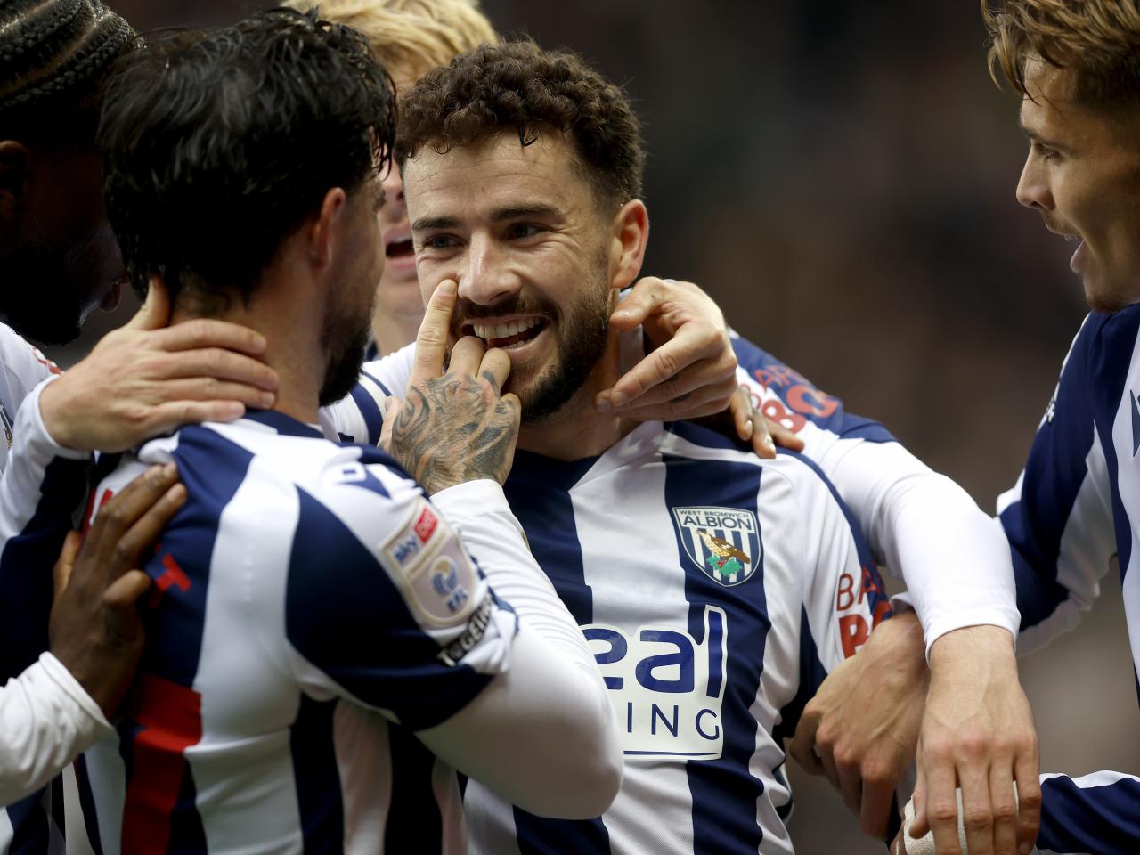 Mikey Johnston celebrates scoring against PNE with team-mates