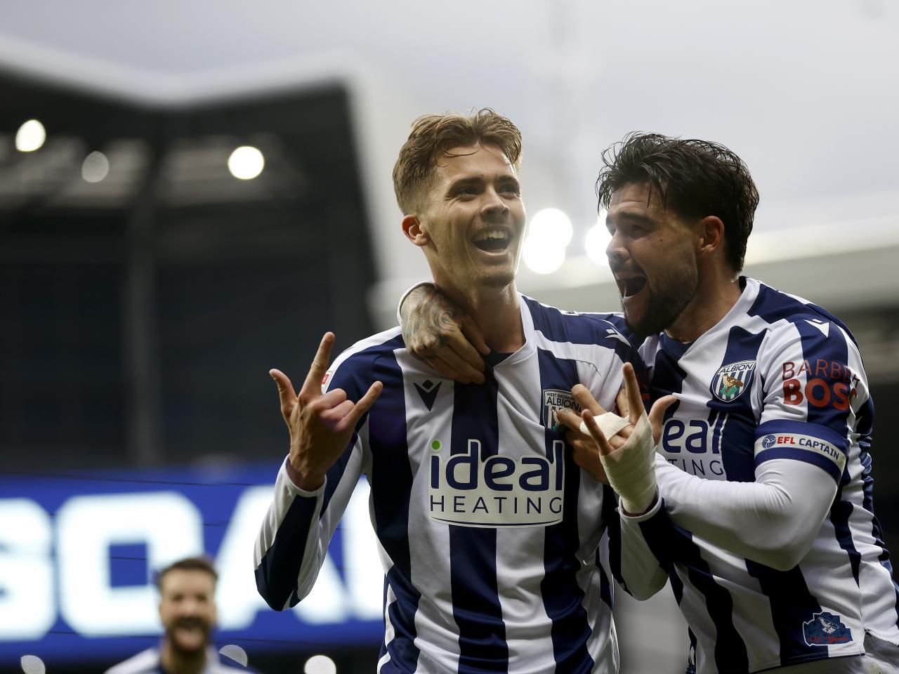 Isaac Price celebrates scoring against PNE with Alex Mowatt