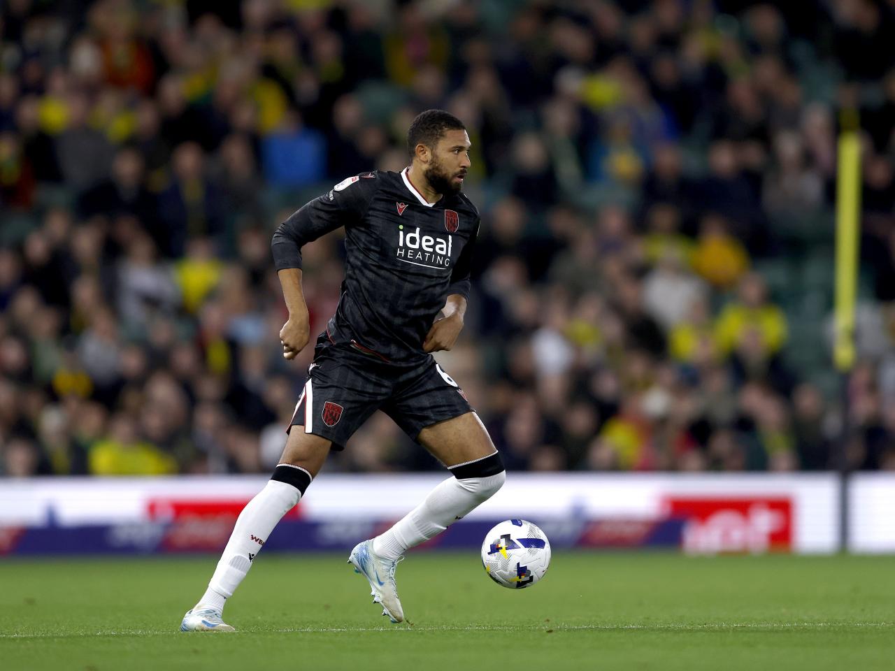 George Campbell on the ball against Norwich 