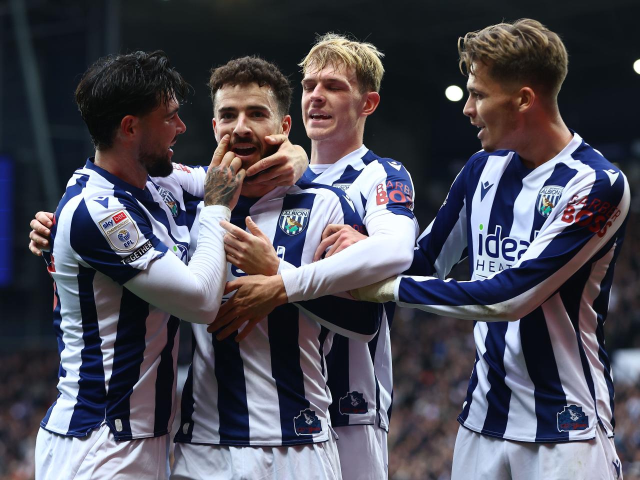 Mikey Johnston celebrates scoring against PNE with team-mates