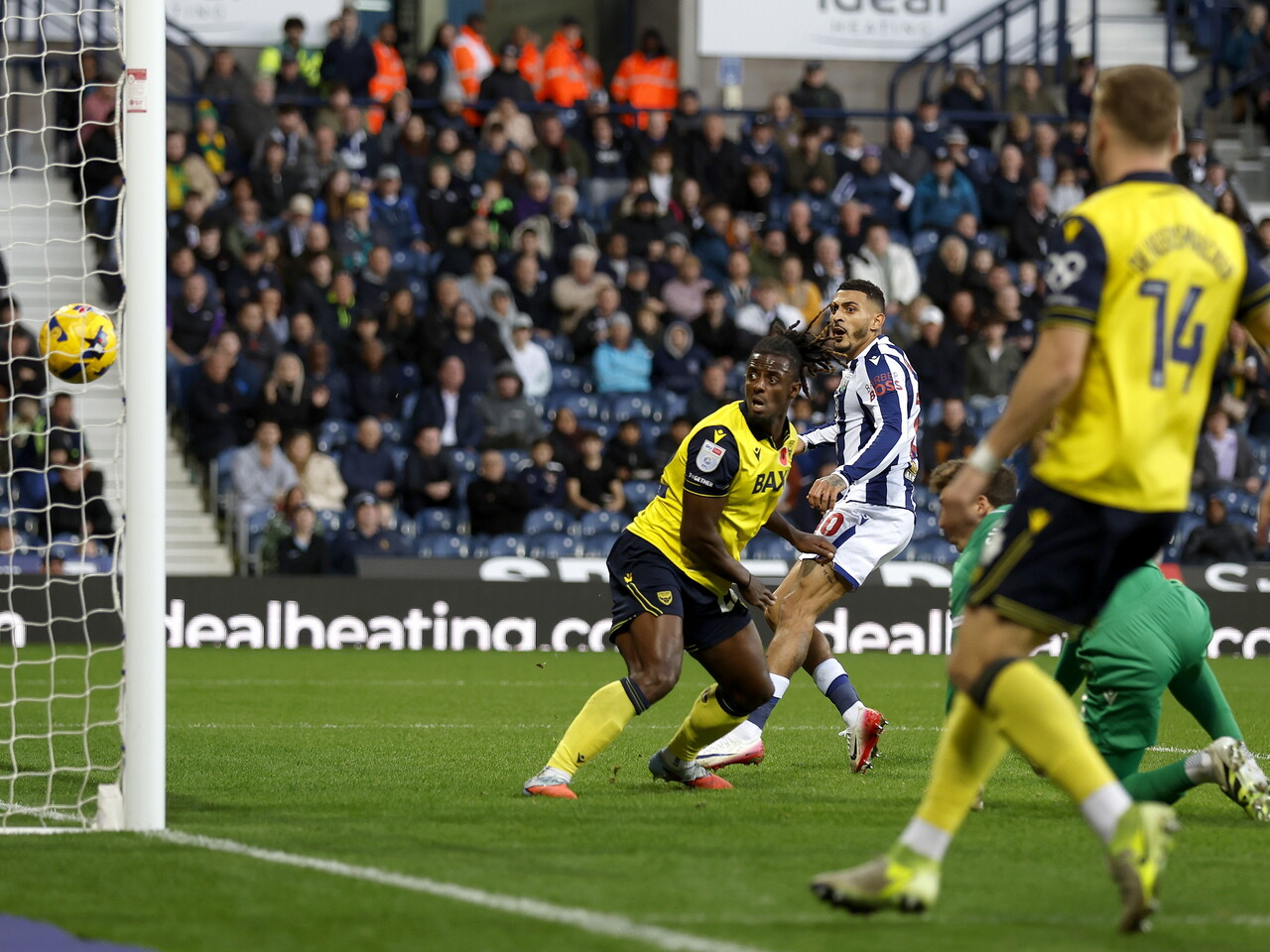 Oxford's Greg Leigh scores an own goal