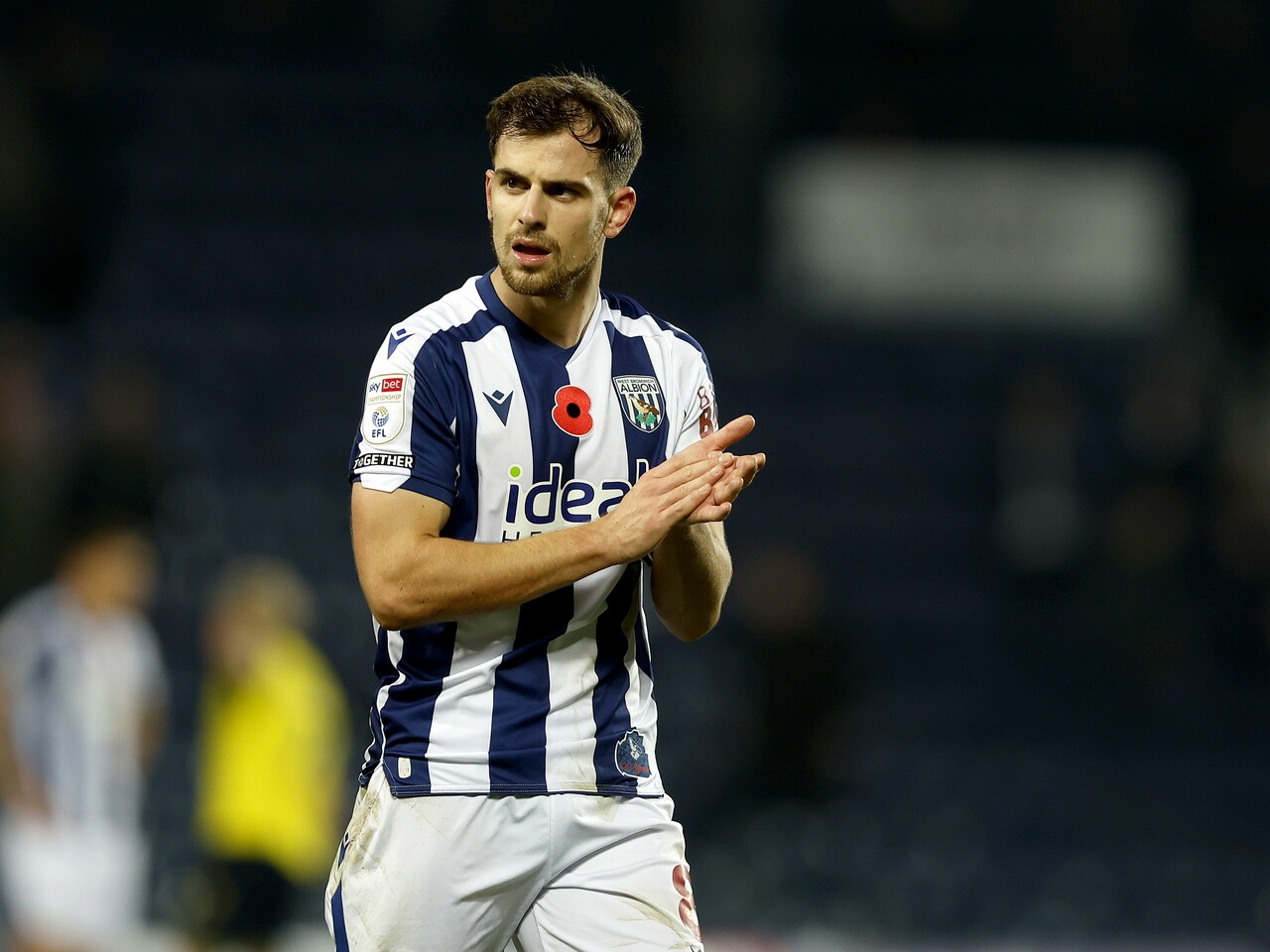 Jayson Molumby clapping WBA fans after the Oxford game