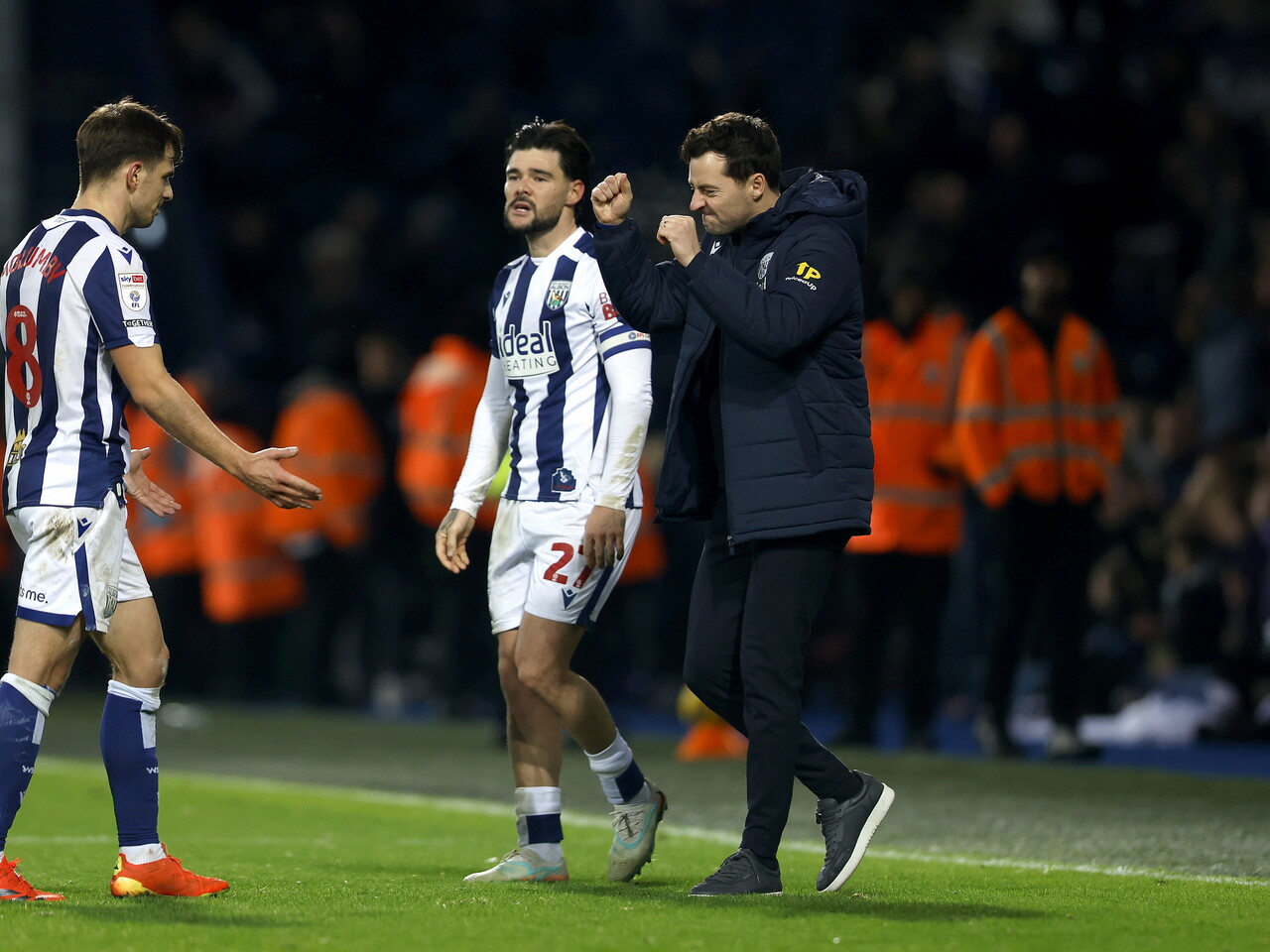 Jayson Molumby and Ryan Mason celebrating Albion's win over Swansea