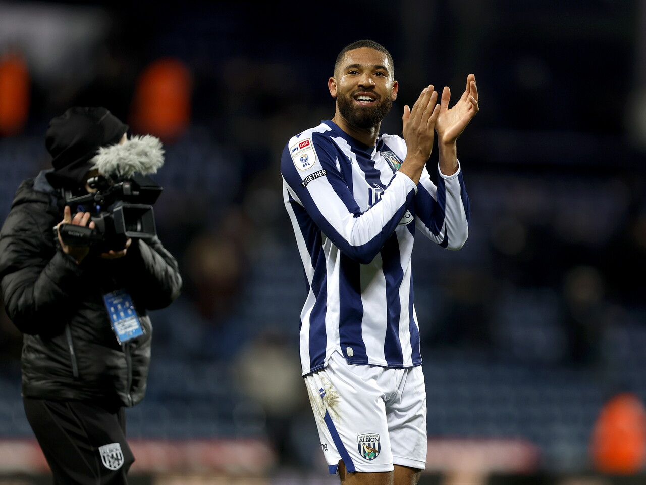 George Campbell applauds WBA fans after the Swansea game