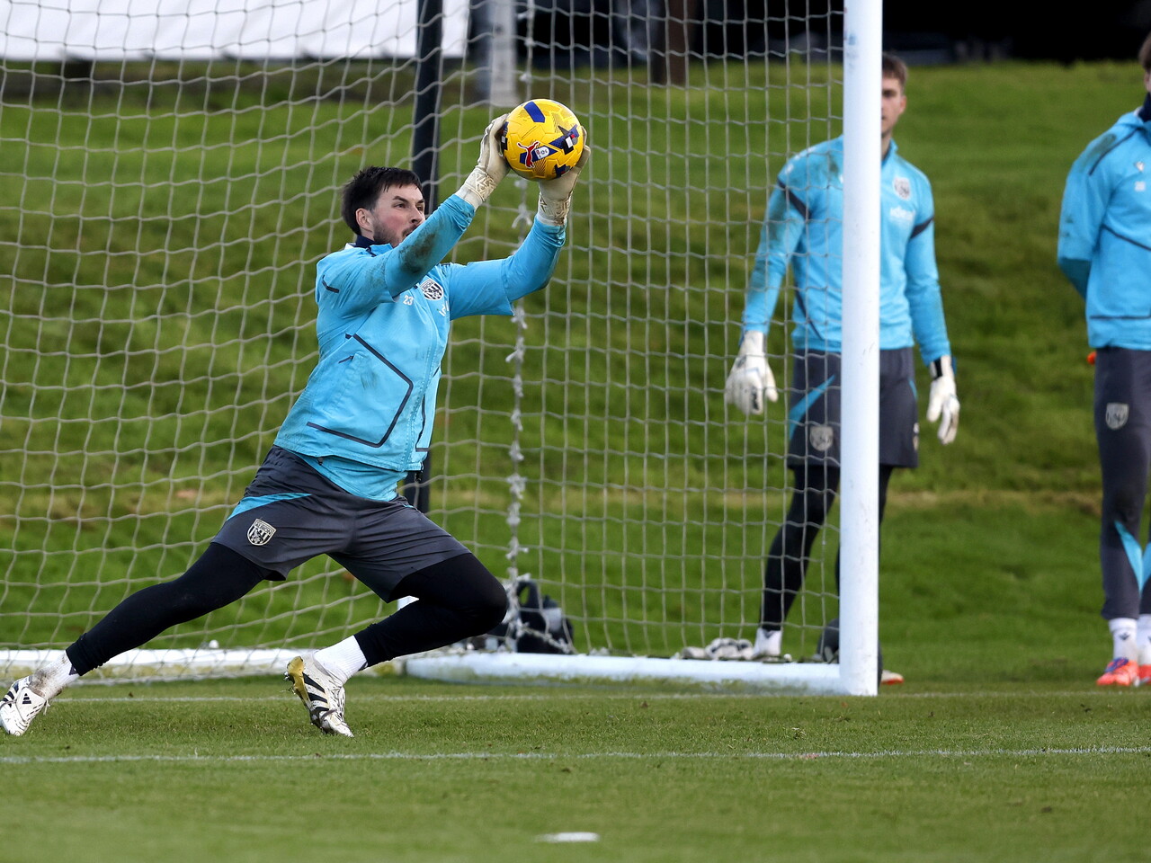 Joe Wildsmith making a save in training