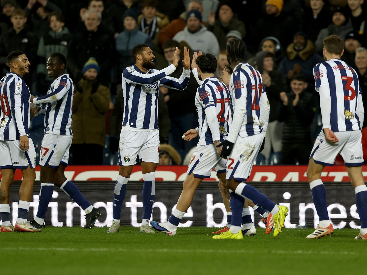 George Campbell celebrates scoring against QPR with team-mates