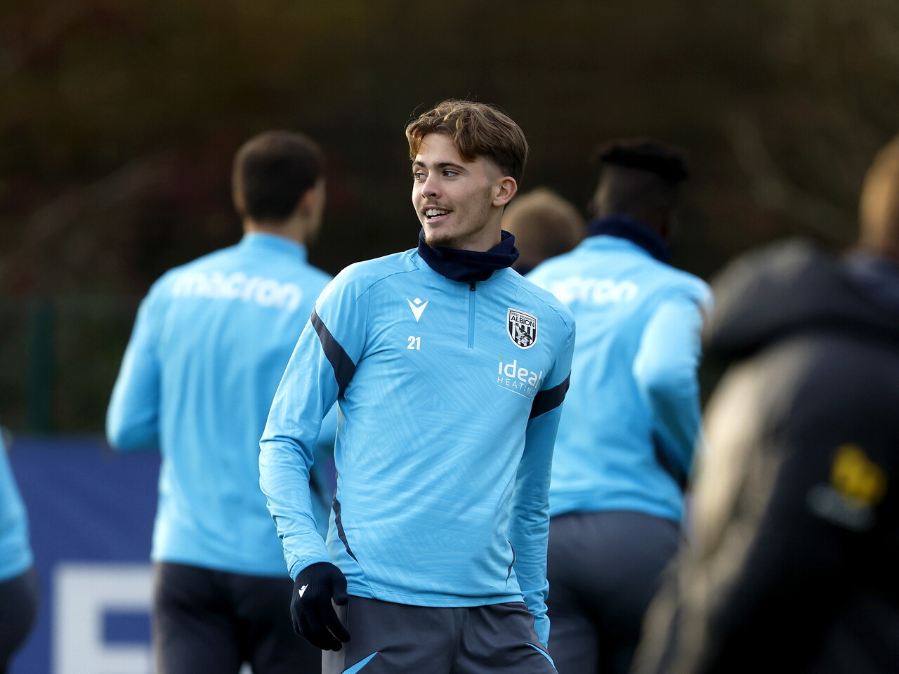 Isaac Price smiling during a training session