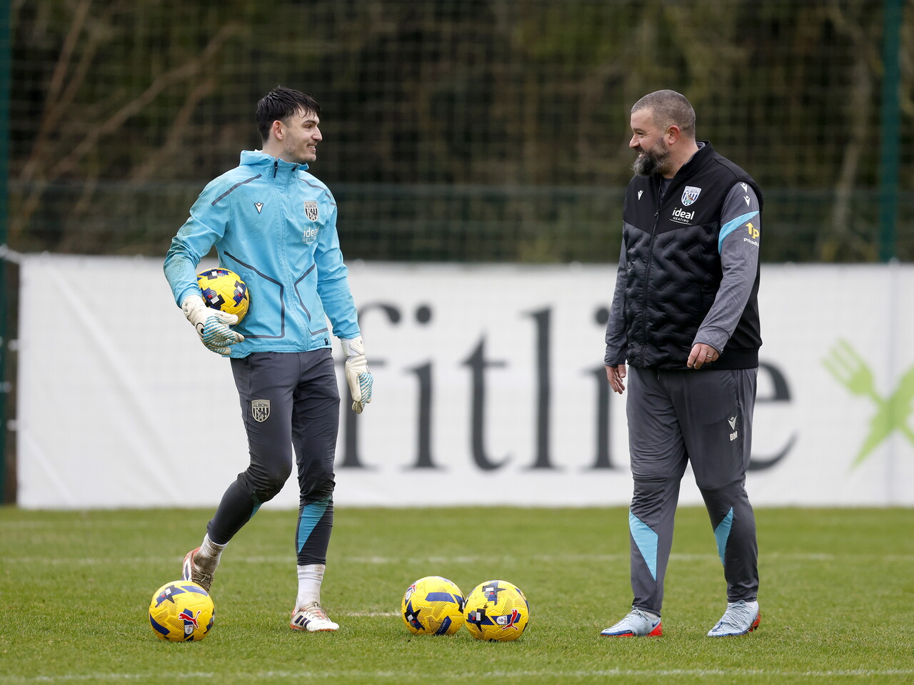 Max O'Leary and Boaz Myhill talking in training