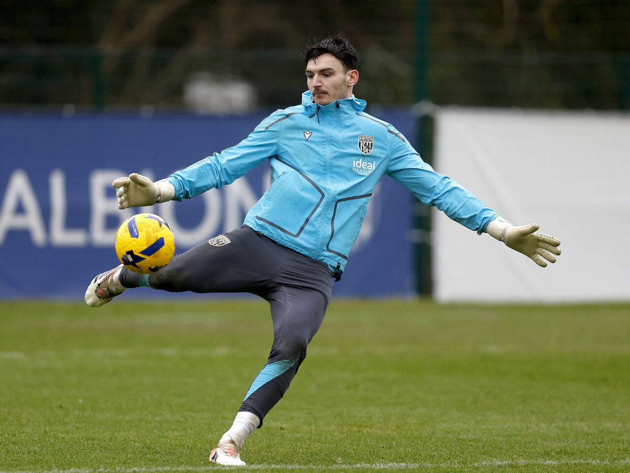 Max O'Leary kicking a ball in training