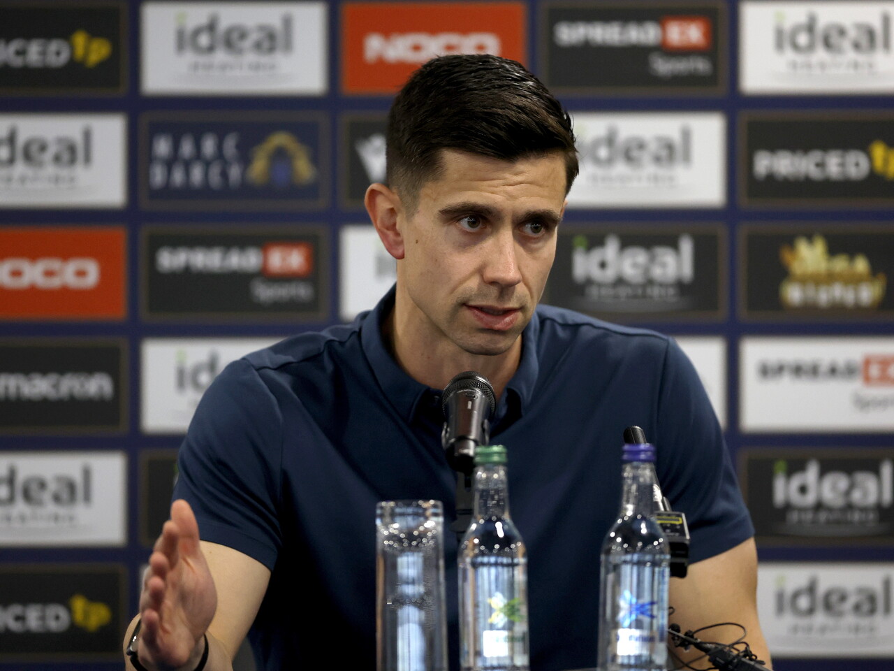 Eric Ramsay speaking to the media during a press conference