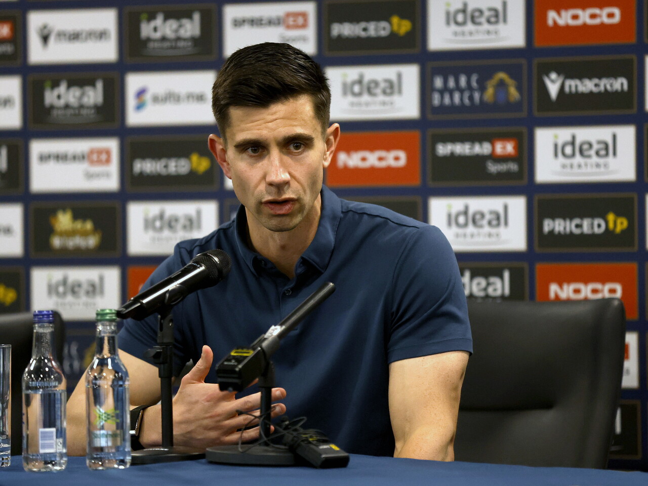 Eric Ramsay speaking to the media during a press conference