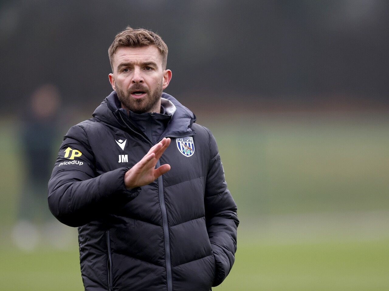 James Morrison delivering instructions to players during a training session