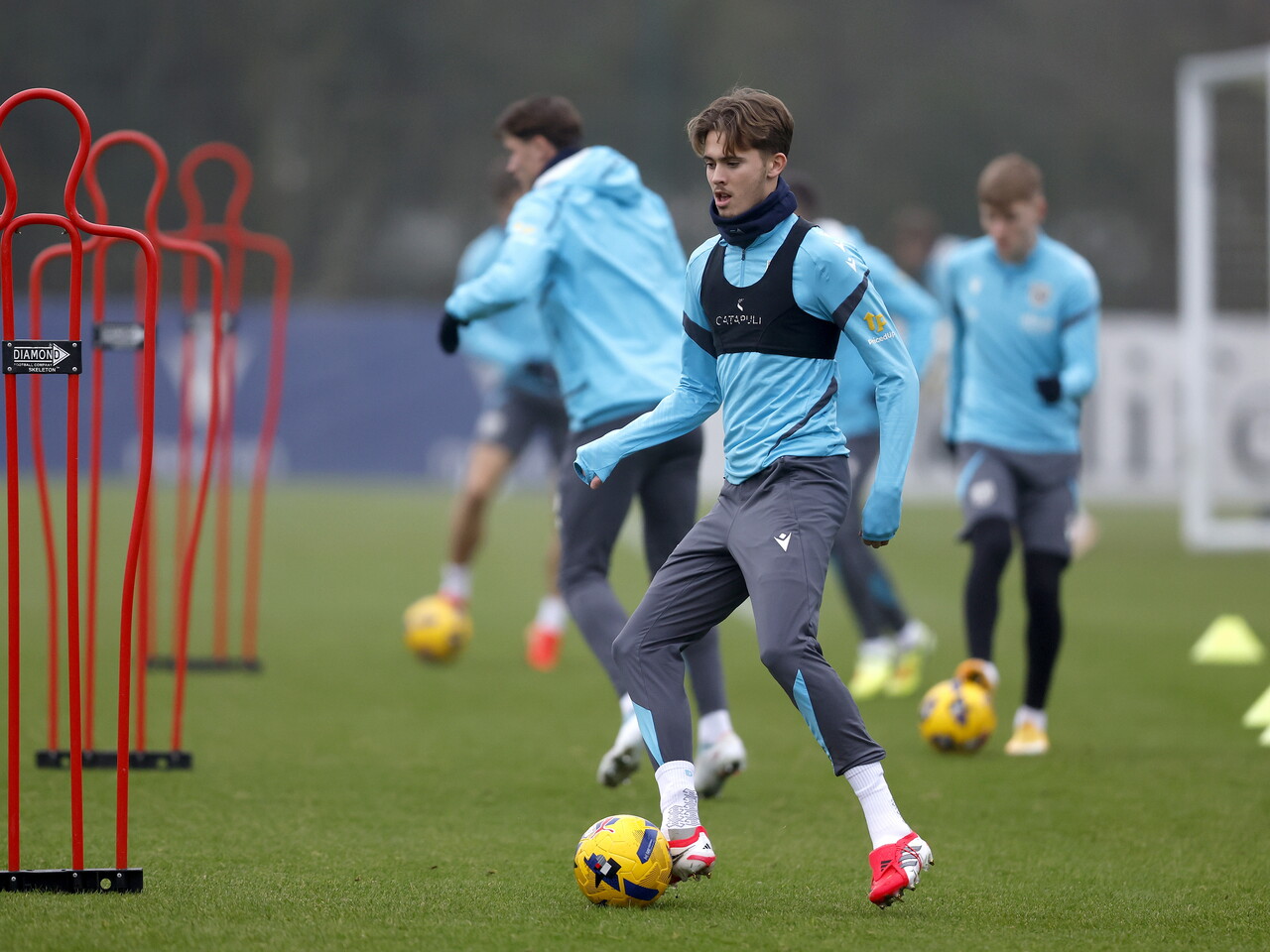 Isaac Price on the ball during training 