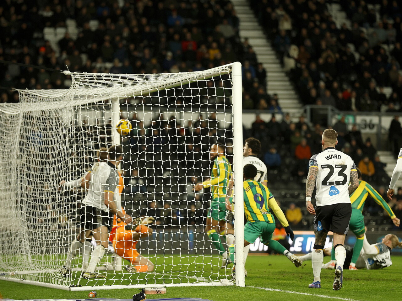 Chris Mepham scoring a header at Derby