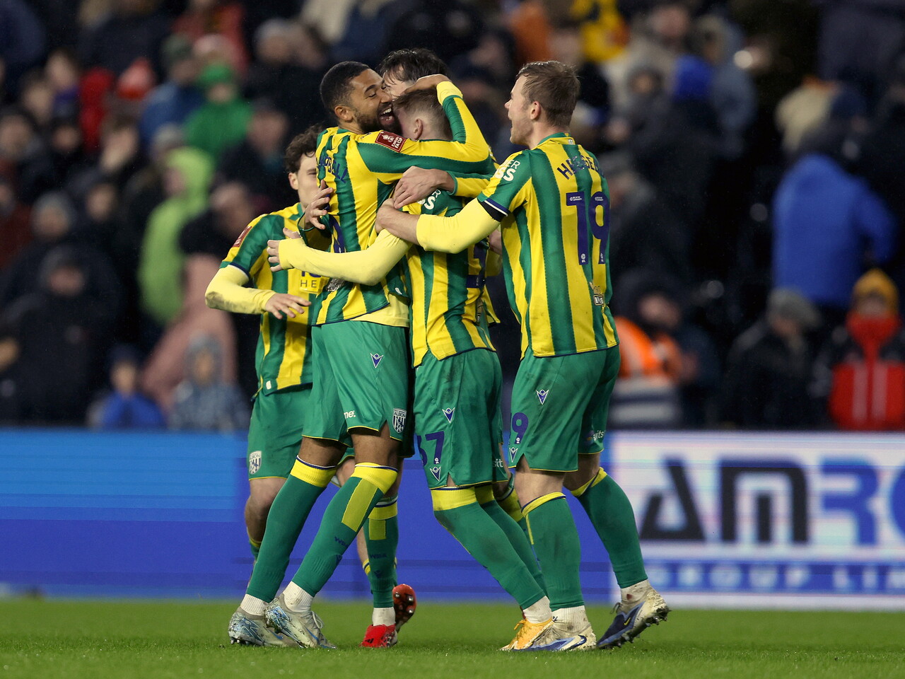 Albion celebrate their penalty shootout win.